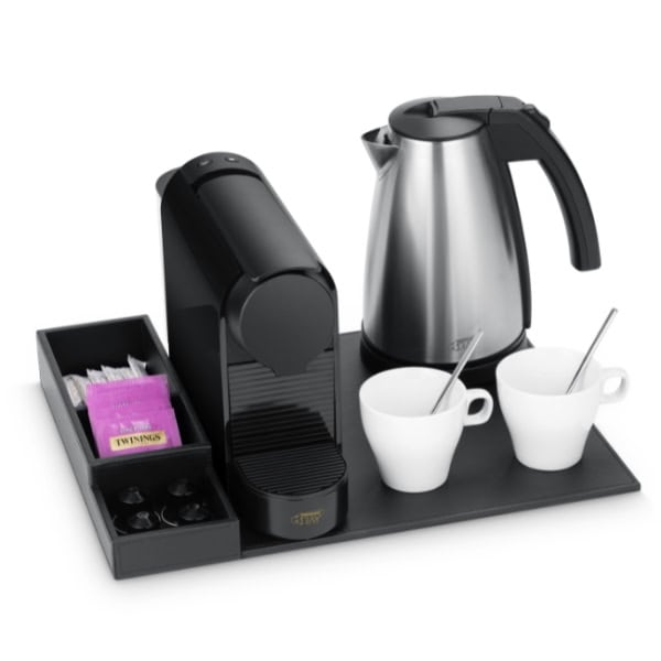 Hospitality tray in hotel room with kettle and cups — view hospitality trays