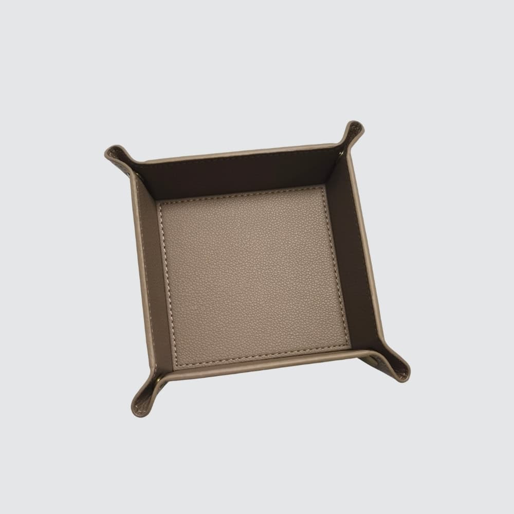 Example of bronze faux leather pocket emptier jewelry tray